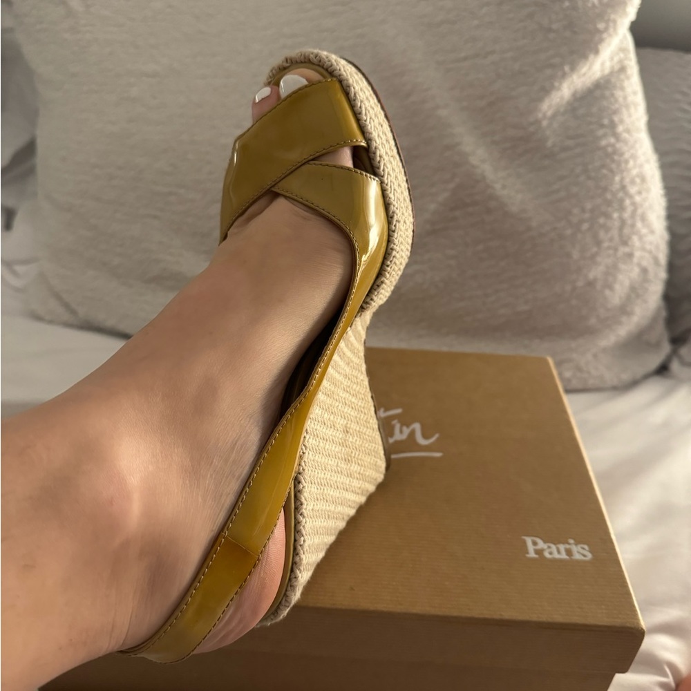 Selling these beautiful Christian Louboutin wedges size 8.5
